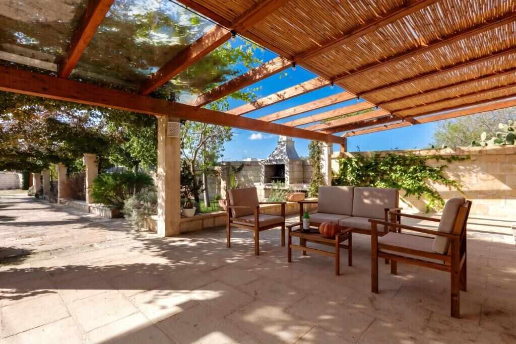 Shaded pergola terrace with lounge seating